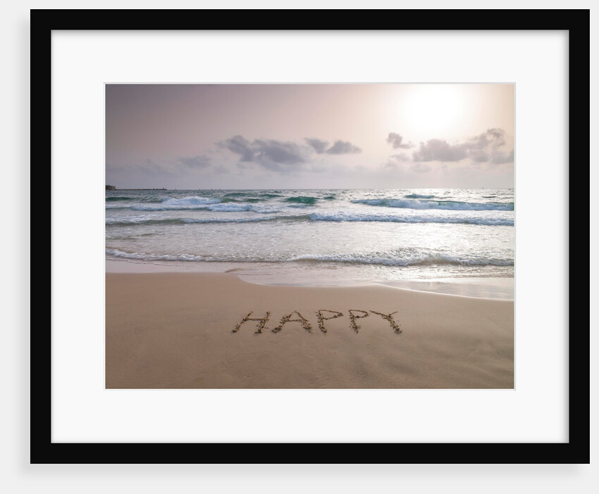 Sand writing on beach by Assaf Frank